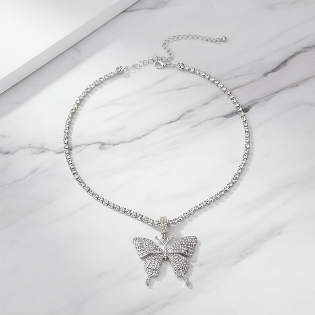 Butterfly necklace on marble