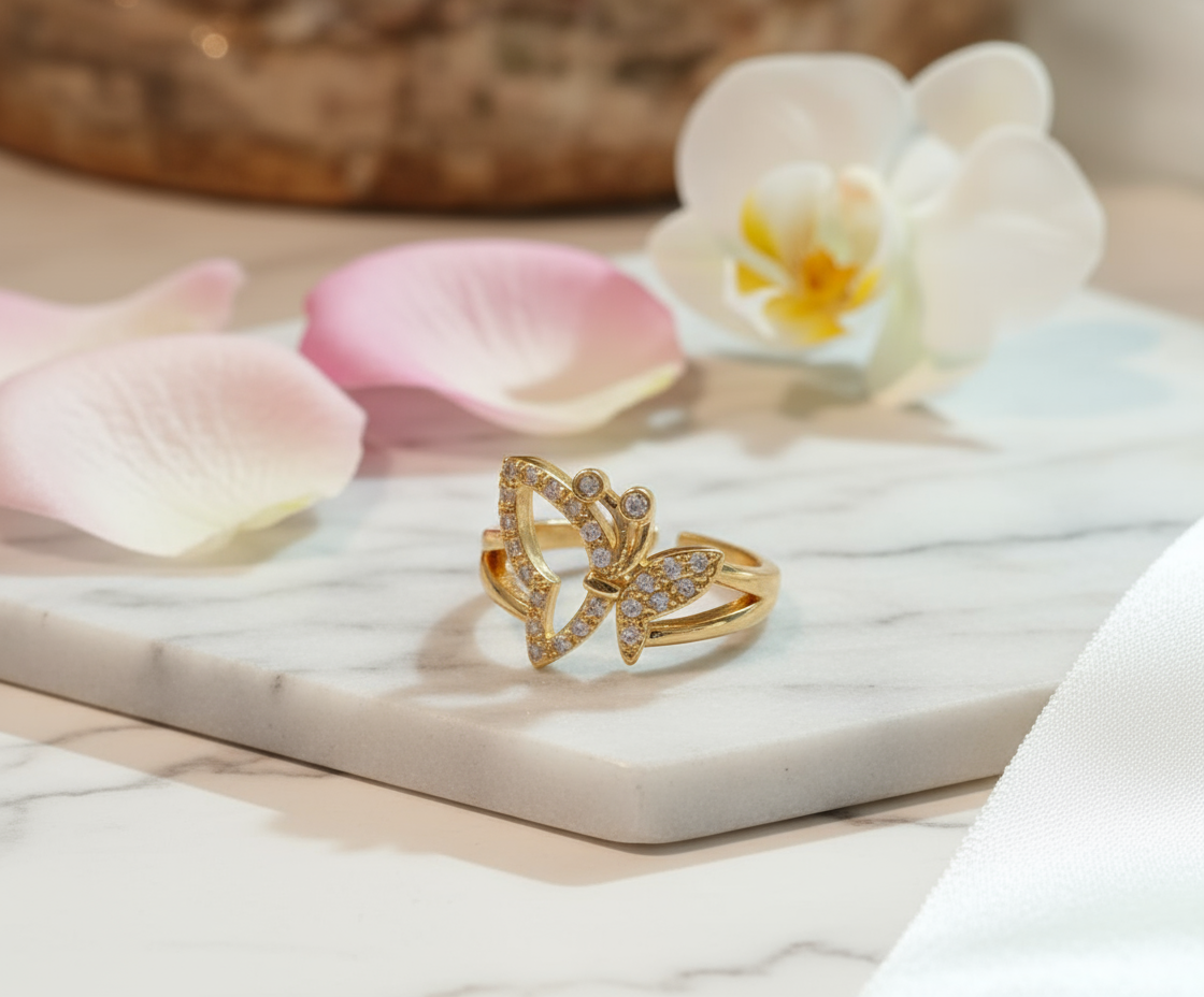 Elegant gold butterfly ring scene