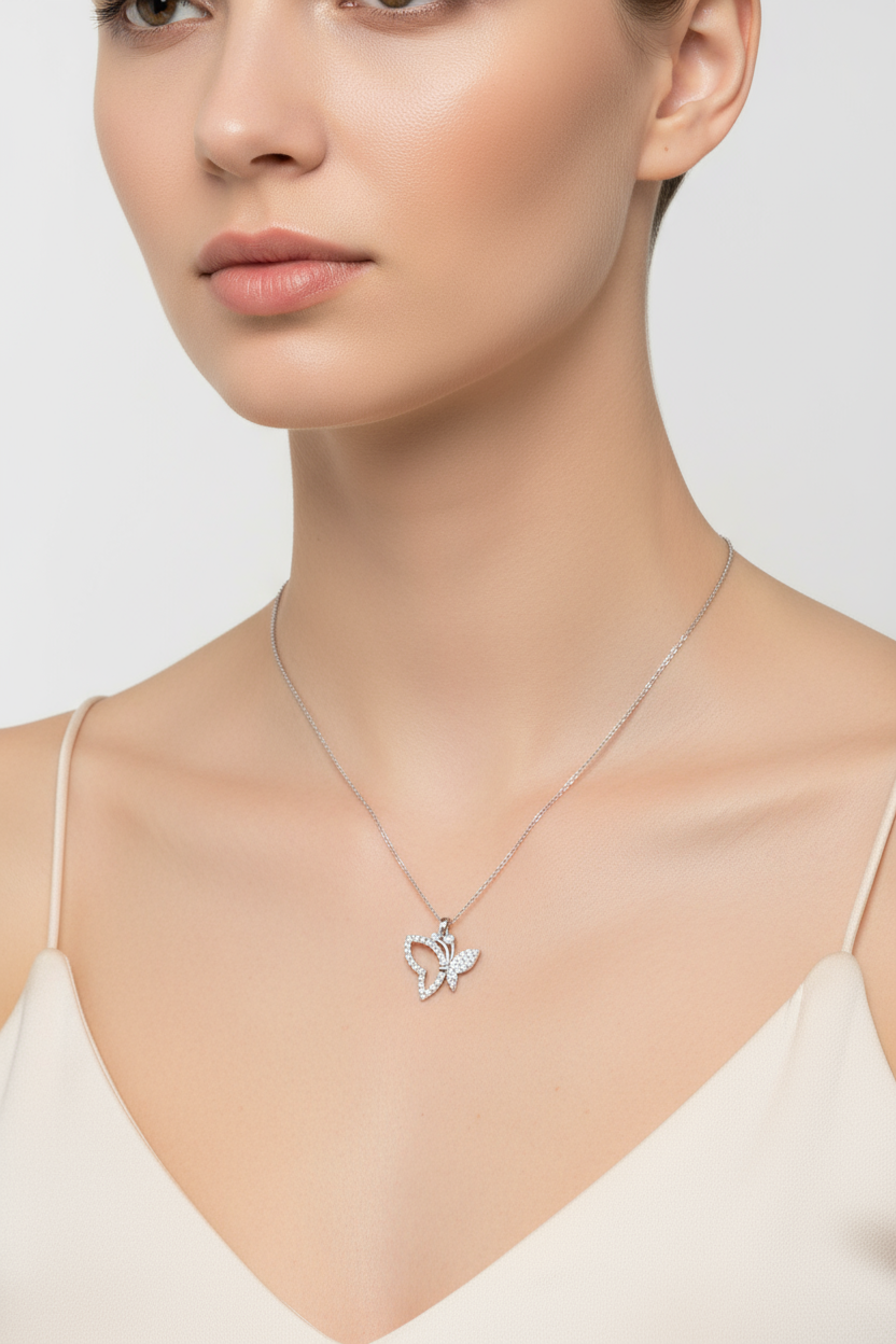 Model wearing butterfly necklace